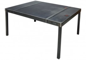Three quarter view of a table made with the trunk of a 1963 Dodge Polara car by Oxyd Factory.